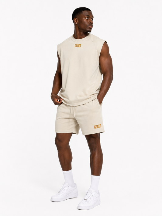 Gold Logo Skin tone tank top and shorts outfit