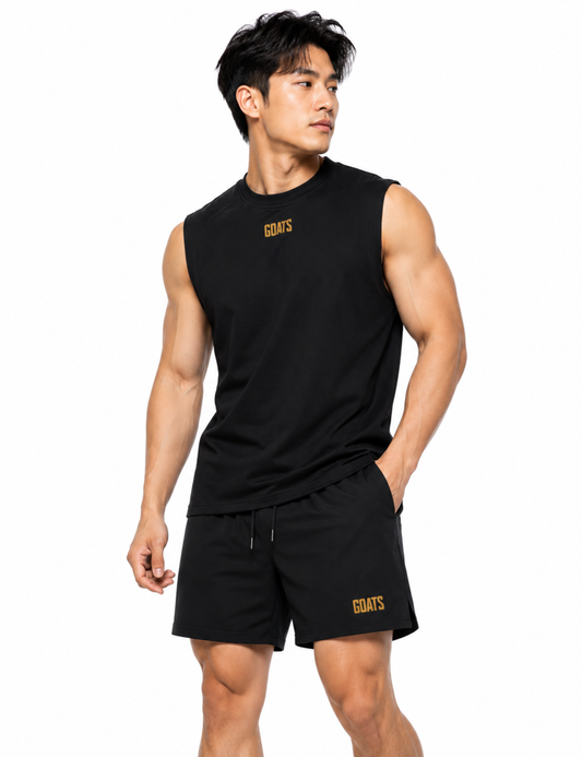 Gold logo tank top and shorts outfit